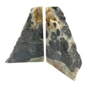 Pair of septarian onyx bookends of rectangular form with polished to three sides with a raw outer ed