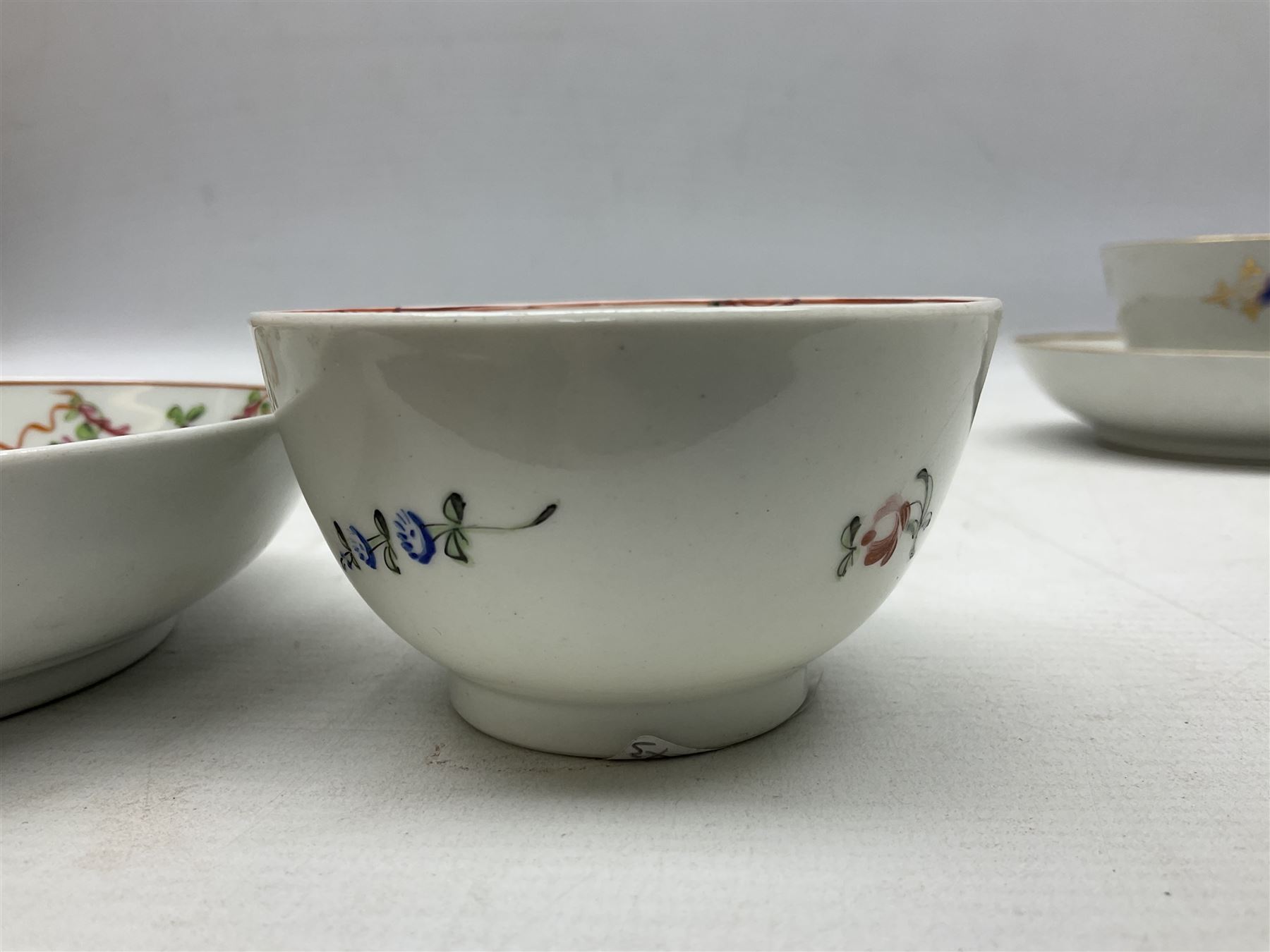 Two 18th century Newhall tea bowls and saucers - Image 12 of 19