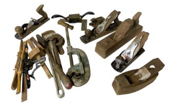 Collection of woodworking planes and other vintage tools