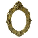 Composite ornate oval gilded wall mirror