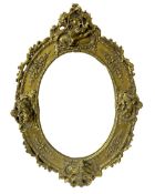 Composite ornate oval gilded wall mirror