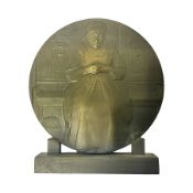 Bronzed circular plaque