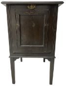 Early 20th century oak 'Barkingside East Light' LP record cabinet; together with a collection of LPs