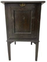 Early 20th century oak 'Barkingside East Light' LP record cabinet; together with a collection of LPs