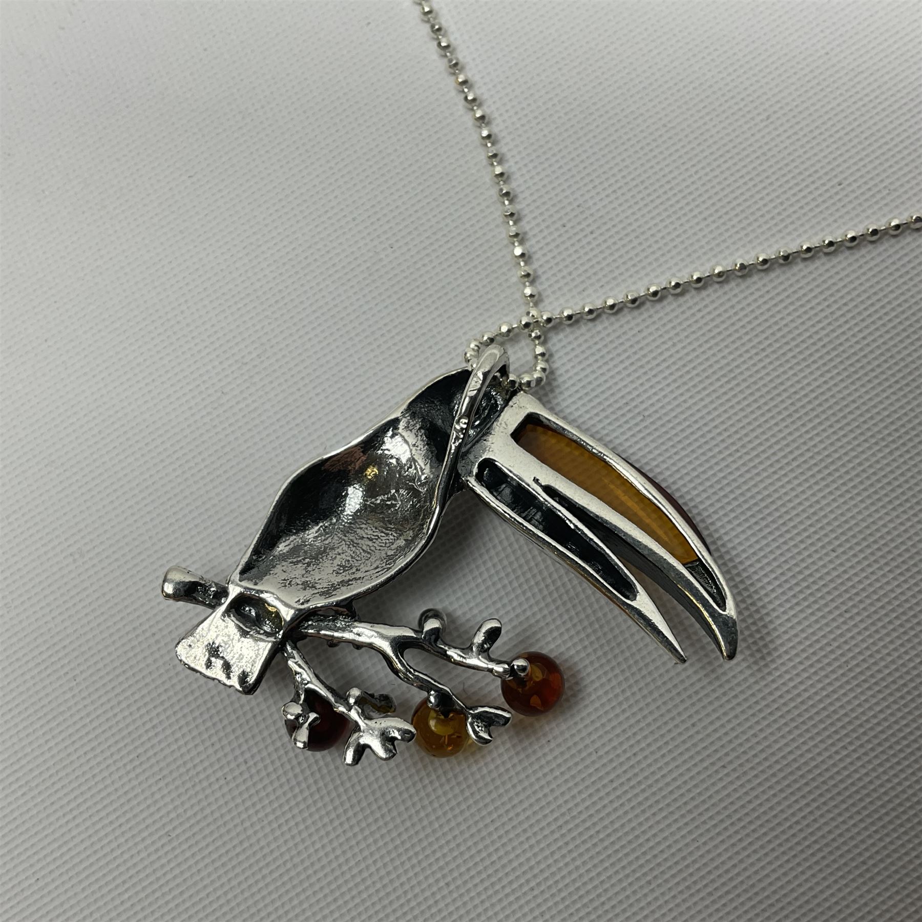 Silver Baltic amber toucan pendant necklace - Image 3 of 3