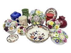 Five ceramic floral displays