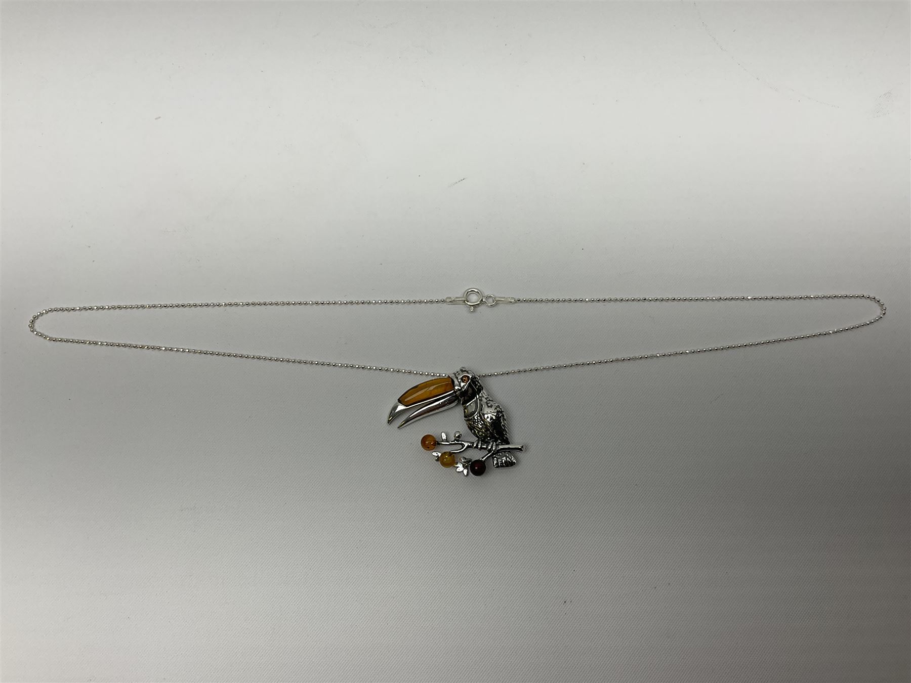 Silver Baltic amber toucan pendant necklace - Image 2 of 3