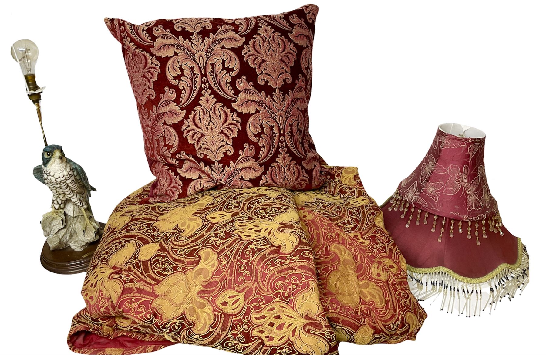 Quilted red and gold bedspread by Sandersons