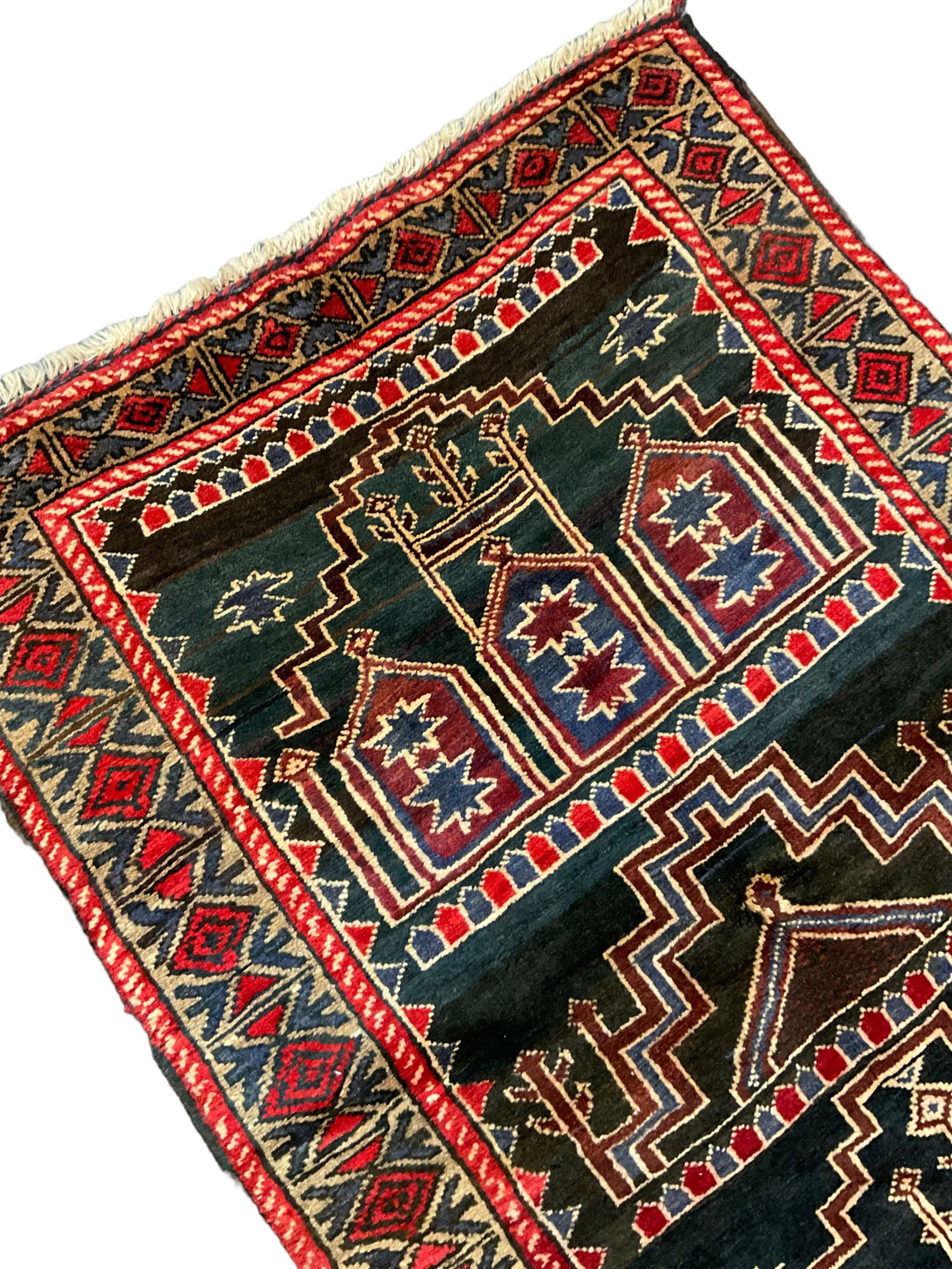 Baluchi dark indigo and crimson ground rug - Image 3 of 5