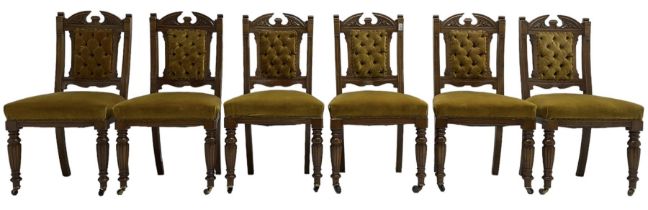Set of six late Victorian carved oak dining chairs