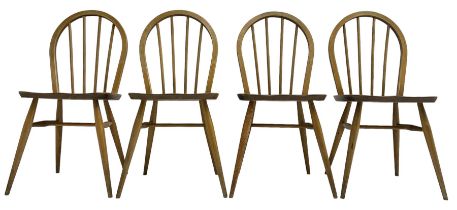 Ercol - circa. 1950s set of four 'Windsor' elm and beech stick and hoop back chairs