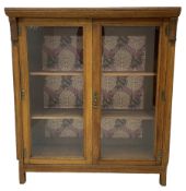 Edwardian oak and glazed bookcase