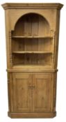 Waxed pine floor standing corner cupboard