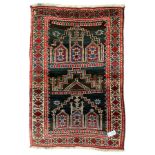 Baluchi dark indigo and crimson ground rug