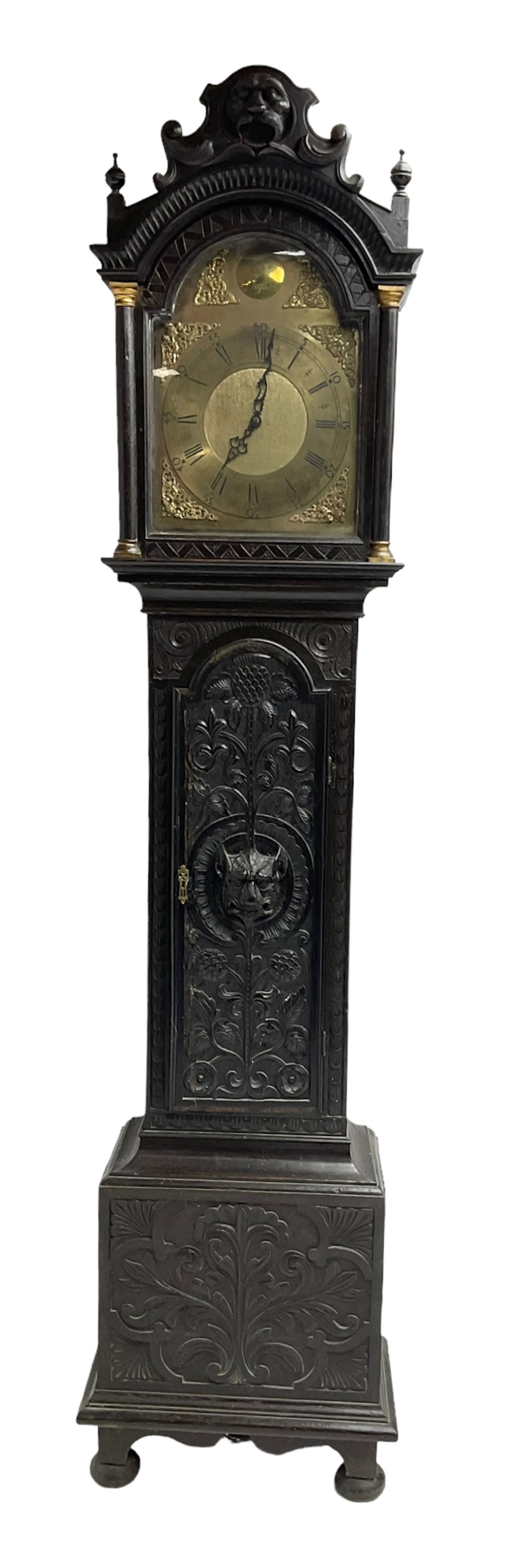 Victorian Jacobean revival oak cased 30 hour longcase clock - with a carved pediment and break arch