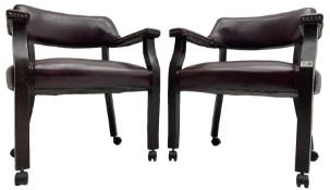 Pair of tub shaped armchairs