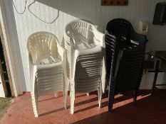 27 White plastic stacking chairs and 15 charcoal stacking chairs