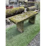 Weathered stone rectangular garden seat bench