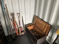 Selection gardening tools and quantity of brass horse cart hub caps and spanners in a wooden trunk