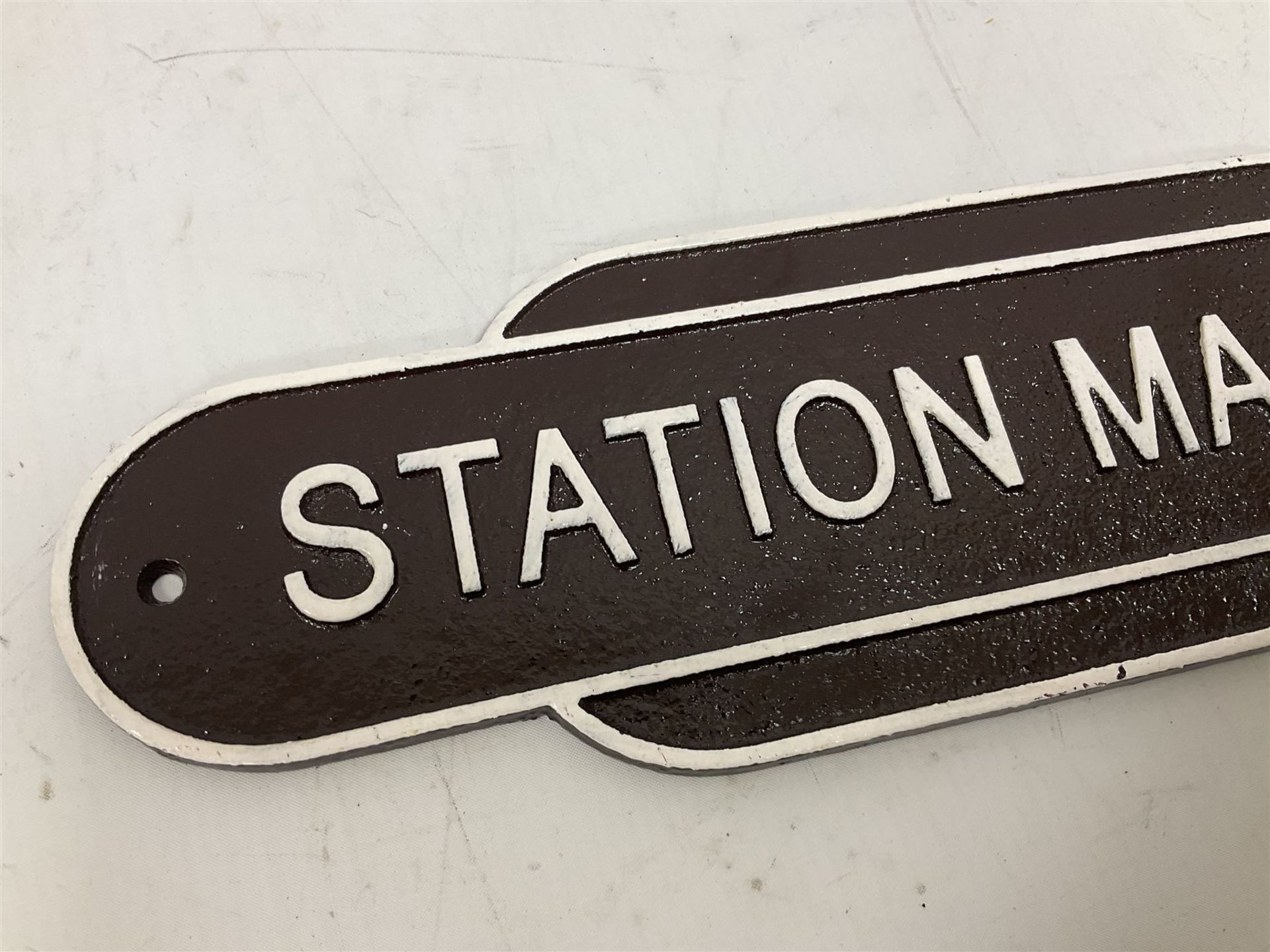 Cast iron Station Master wall plaque on a brown ground - Image 2 of 4