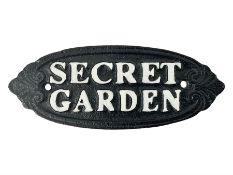 Cast iron oval sign 'Secret Garden' L17cm THIS LOT IS TO BE COLLECTED BY APPOINTMENT FROM DUGGLEBY