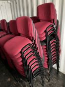 Twenty red and three black fabric metal conference chairs