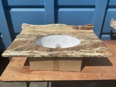 Marble and glazed bathroom sink with chrome pop up drain