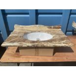 Marble and glazed bathroom sink with chrome pop up drain