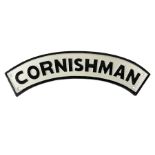 Arched cast iron Cornishman sign