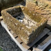 Small rectangular carved stone trough