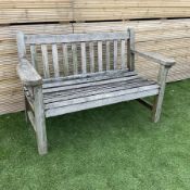 Solid teak two seat garden bench - THIS LOT IS TO BE COLLECTED BY APPOINTMENT FROM DUGGLEBY STORAGE