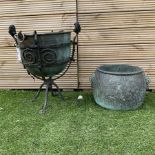 Small wrought metal garden planter with liner