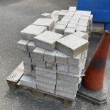 Quantity of square granite brick sets