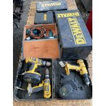 Three DeWalt battery drills