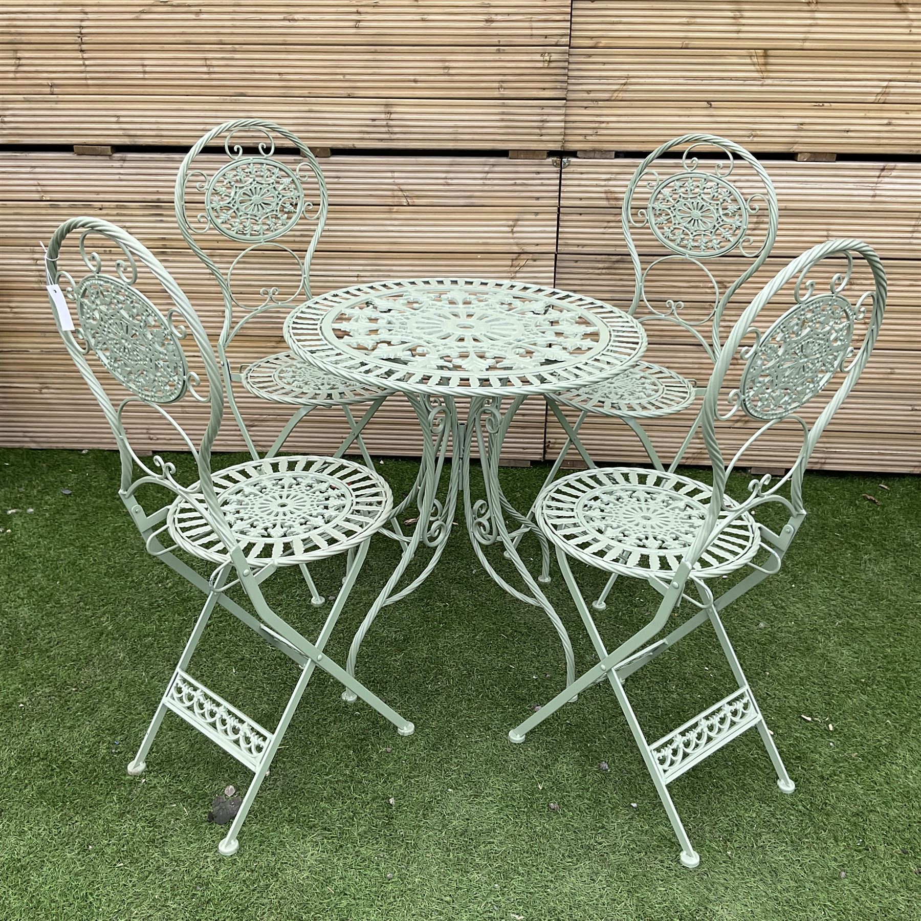 Circular wrought iron green painted garden table