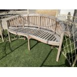 Teak curved serpentine bench - THIS LOT IS TO BE COLLECTED BY APPOINTMENT FROM DUGGLEBY STORAGE