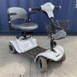 Four wheel electric mobility scooter in white with keys and charger - THIS LOT IS TO BE COLLECTED B
