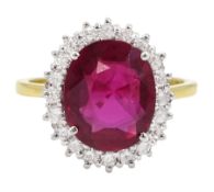 18ct gold oval cut Thai ruby and round brilliant cut diamond cluster ring