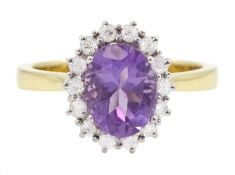 18ct gold oval cut amethyst and round brilliant cut diamond cluster ring