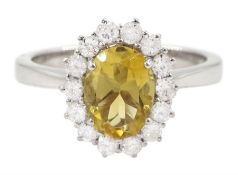 18ct white gold oval cut citrine and round brilliant cut diamond cluster ring