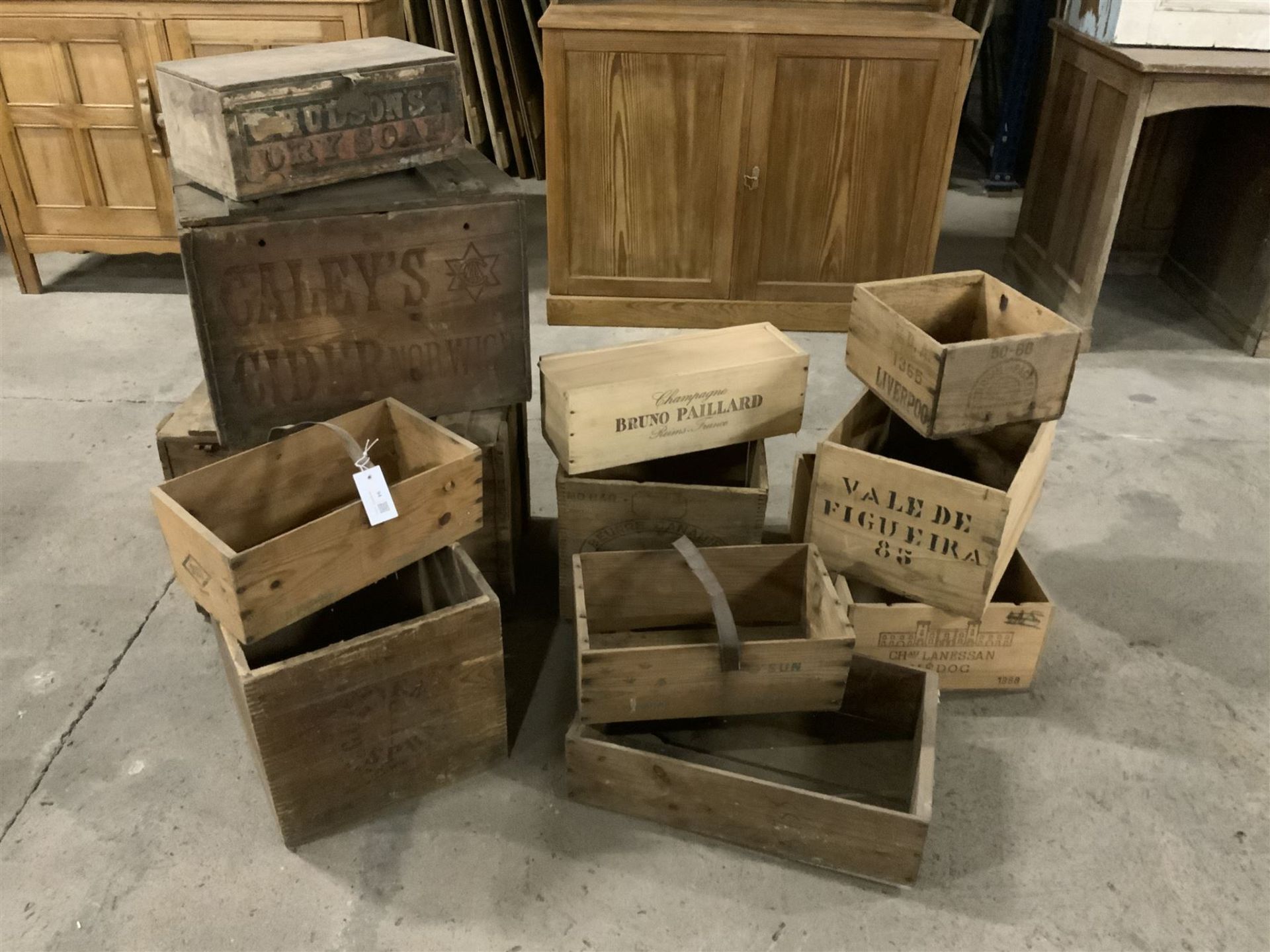 Twelve vintage wine and advertising boxes