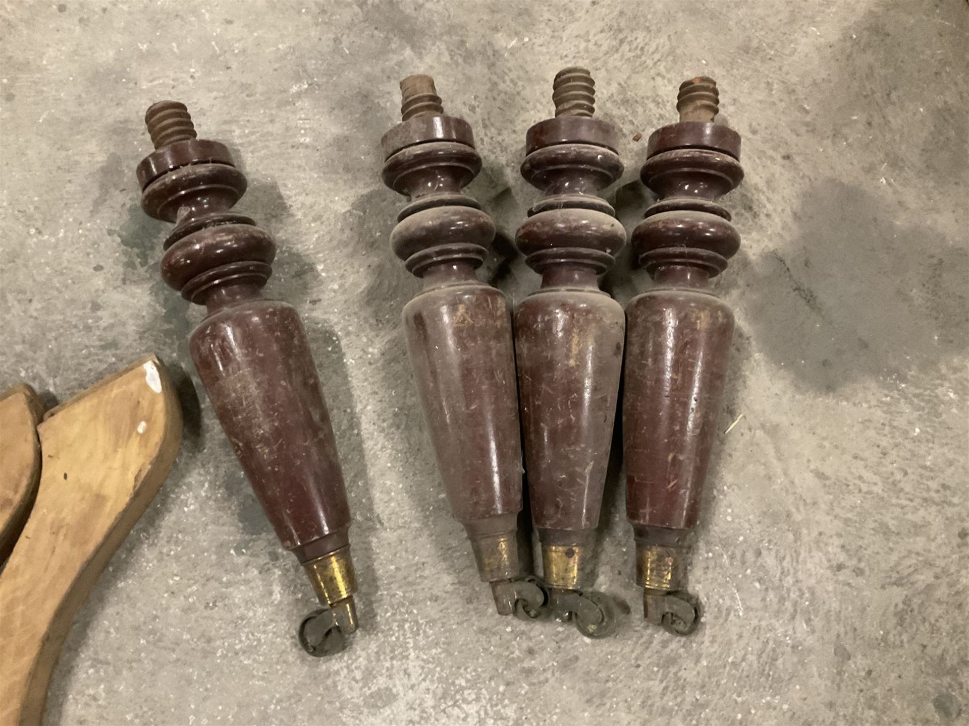 Set of four turned mahogany supports with brass cups and castors (H51cm); collection of splayed supp - Image 2 of 5