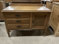 Early 20th century small oak sideboard with raised back