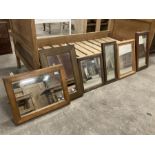 Collection of six wooden framed mirrors