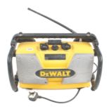 A DEWALT battery and mains radio