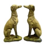 A pair of reconstituted stone models of whippets.