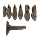 A collection of 19th and 20th century iron shoe lasts.