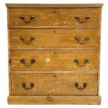 A late George III scrumbled pine four drawer chest.