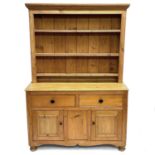 A Victorian pine kitchen dresser.