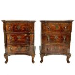 A pair of continental walnut small chests.